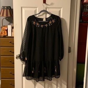 Black dress with embroidery accents